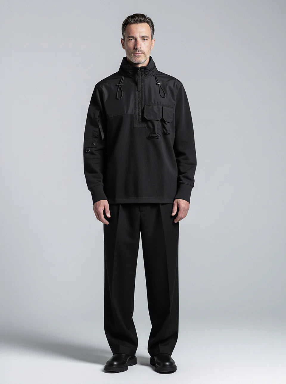 HALF ZIP HYBRID SWEATER